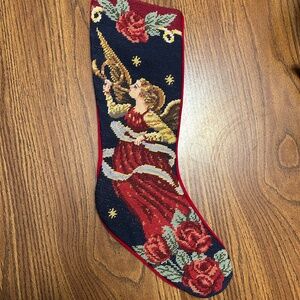 Hand stitched crewel Christmas stocking. angel with horn.